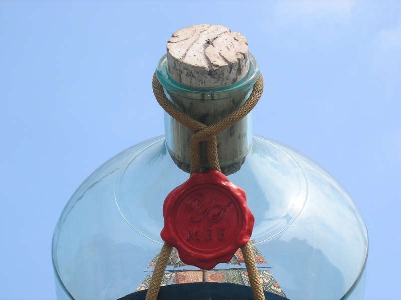 sphere, day, outdoors, no people, buddelschiff, art and craft, bottle, reflection, creativity, low angle view, blue, architecture, 2K, seal, cork, metal