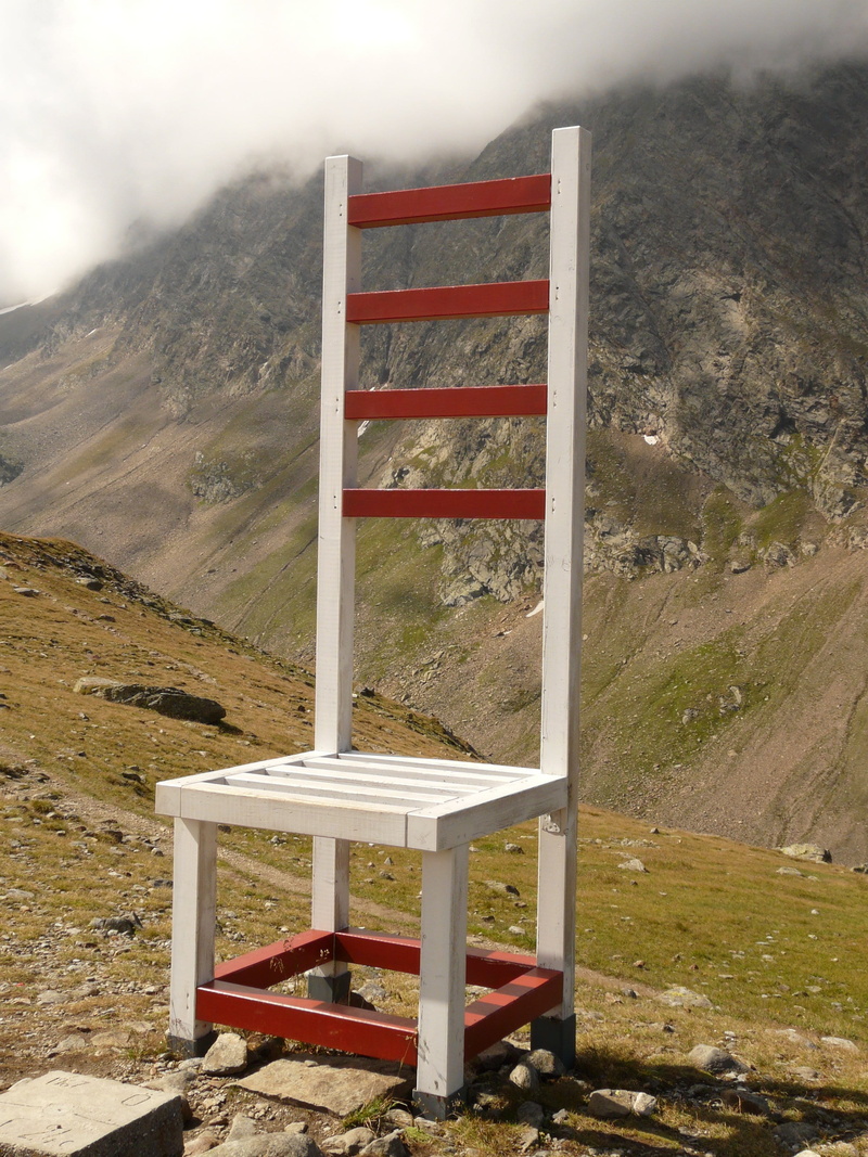 outdoors, plus size, seat, field, oversized, no people, chair, sky, mountain, tranquil scene, landscape, environment, mountain range, plant, idyllic, scenics - nature