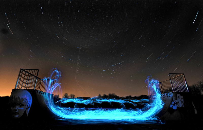fence, Sky, tops, star field, night, light painting, graphics, no people, blurred motion, star - space, boarding, illuminated, digital composite, metal