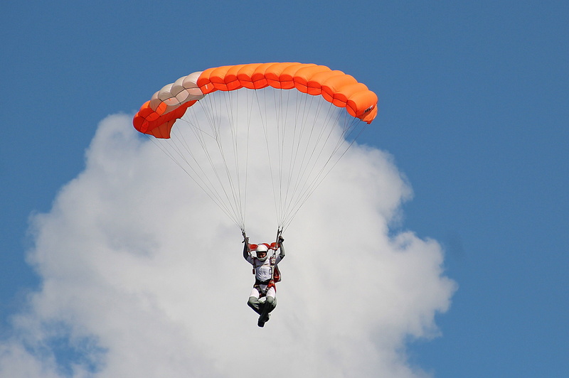 paraglider, extreme sports, clouds, man, leisure activity, flying, blue, daytime, transportation, wind, sky, directing linen, glide, skydiving, outdoors