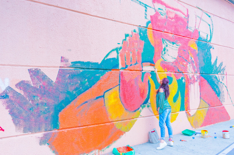 urban mural, daytime, city, wall, offspring, full length, adult, painting, medellin, women, wall - building feature, mural, urban art, people, multi colored