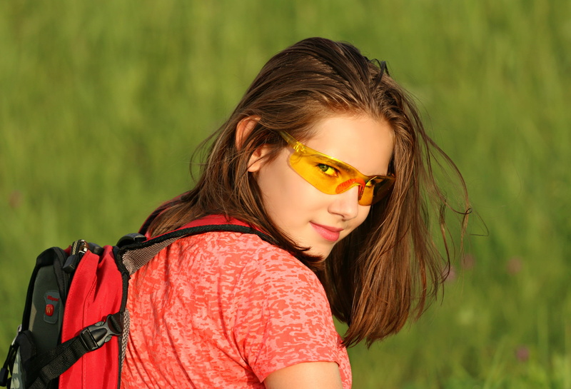 hairstyle, day, beautiful woman, green color, headshot, body part, looking at camera, young adult, red, brown hair, portrait, focus on foreground, halt