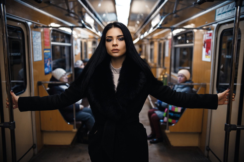 long hair, depth of field, metro, looking at viewer, women, black hair, black coat, 2K, Artem SolovЬev, Viktoria Efremycheva, portrait, coats
