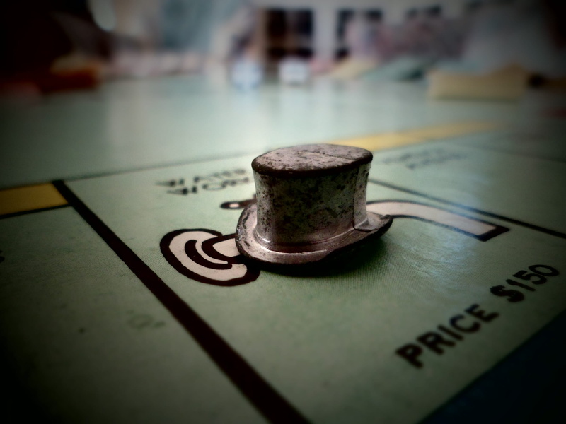 blurr, still life, focus on foreground, writing, script, non-western script, monopoly piece, new york, monopoly, metal, no people, green, selective focus