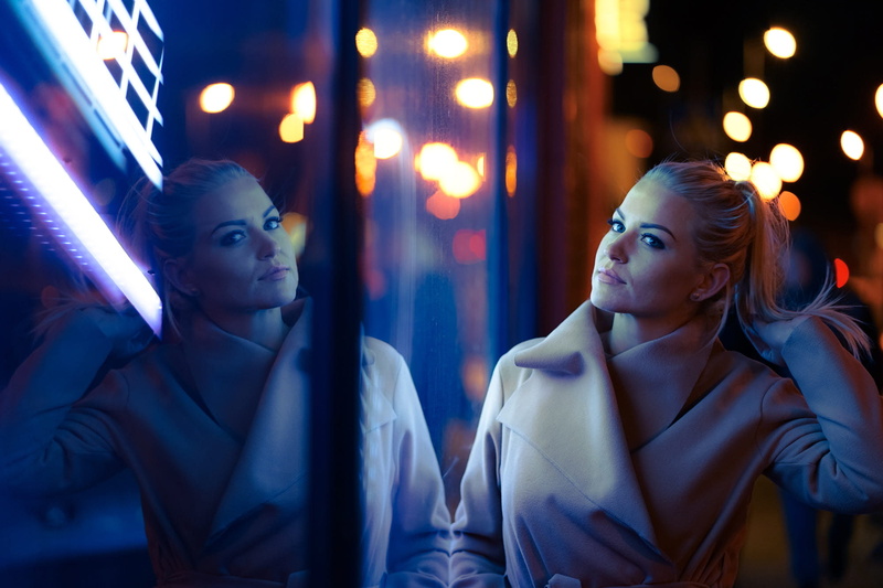 coats, city lights, blue eyes, glamour women, night, face, portrait, reflection, ponytail, white coat, Tomas Kareiva, 1080P, women outdoors, touching hair