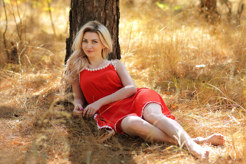 one person, women outdoors, young adult, outdoors, contemplation, plant, sitting, beautiful woman, Murat Kuzhakhmetov, 1080P, red dress, dress, long hair