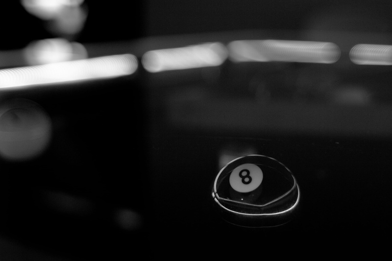 still life, power supply, shape, geometric shape, selective focus, photo, ball, photography, black, indoors, circle, table, no people, eight, close-up