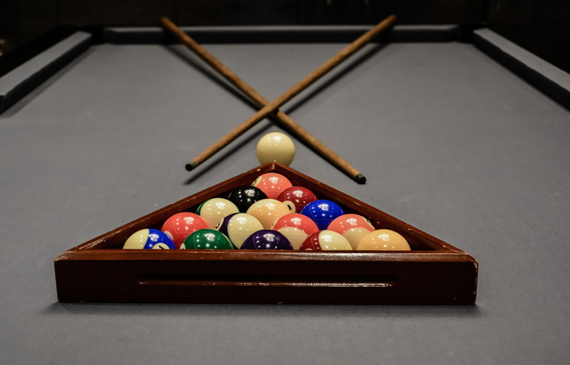 felt, relaxation, close-up, sphere, no people, table, triangle shape, bowl, pool - cue sport, pool table, cross, chocolate, shape, snooker, game, focus on foreground