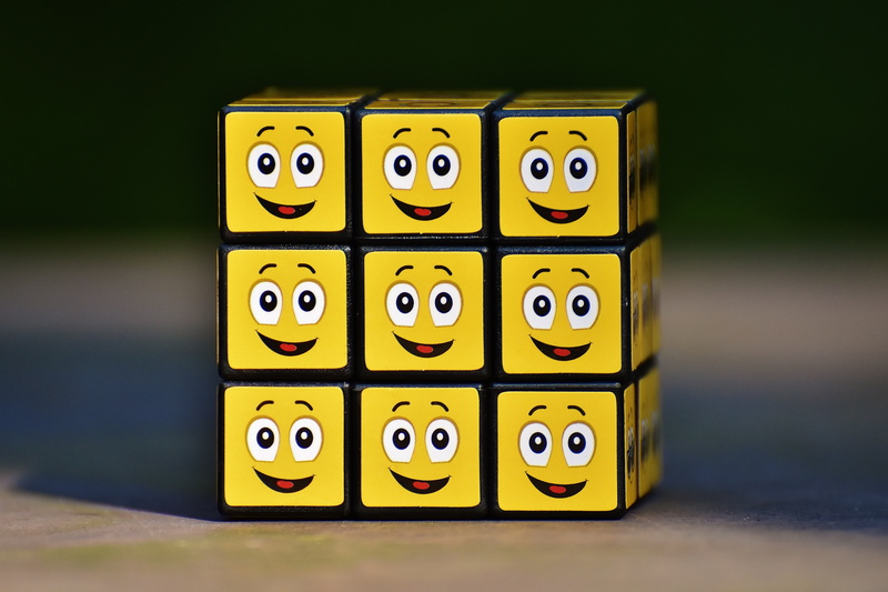equipment, studio shot, feelings, smile, no people, funny, control, emoji, copy space, in a row, emotions, table, close-up, x, communication, large group of objects