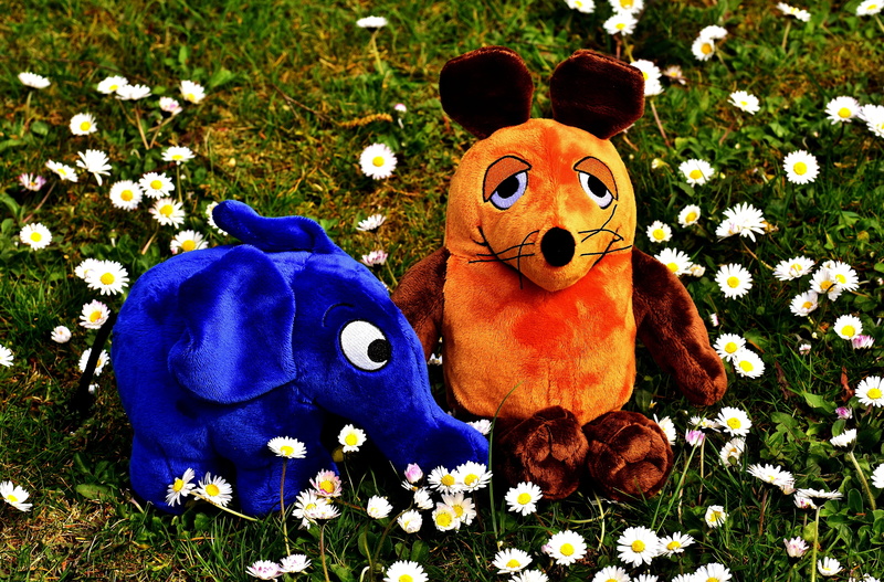 purple, orange, plant, representation, field, flower, stuffed toy, close-up, stuffed animal, grass, cute, 5K, broadcast with the mouse, funny, mammal