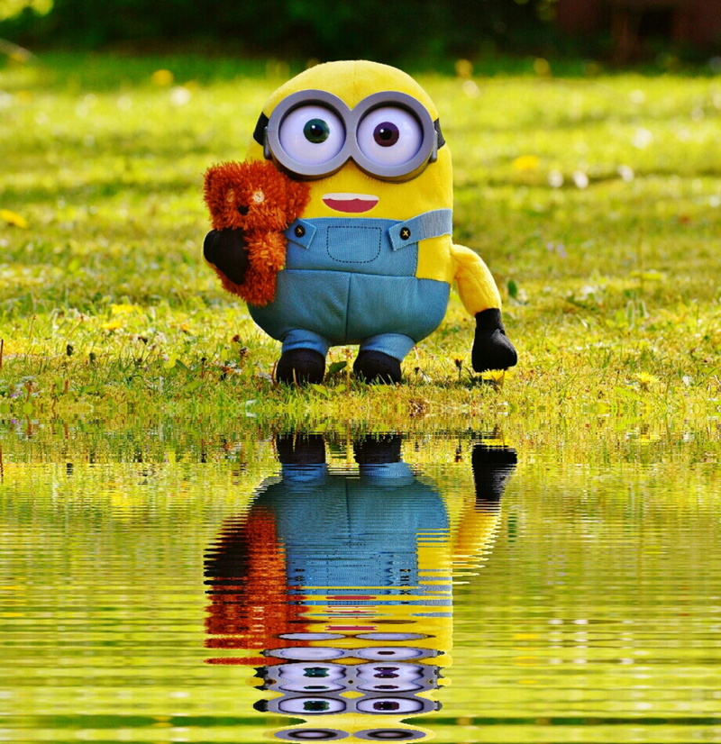 waterfront, creativity, reflection, representation, toy, multi colored, play, art and craft, figure, grass, day, one person, children, stuffed animal, lake