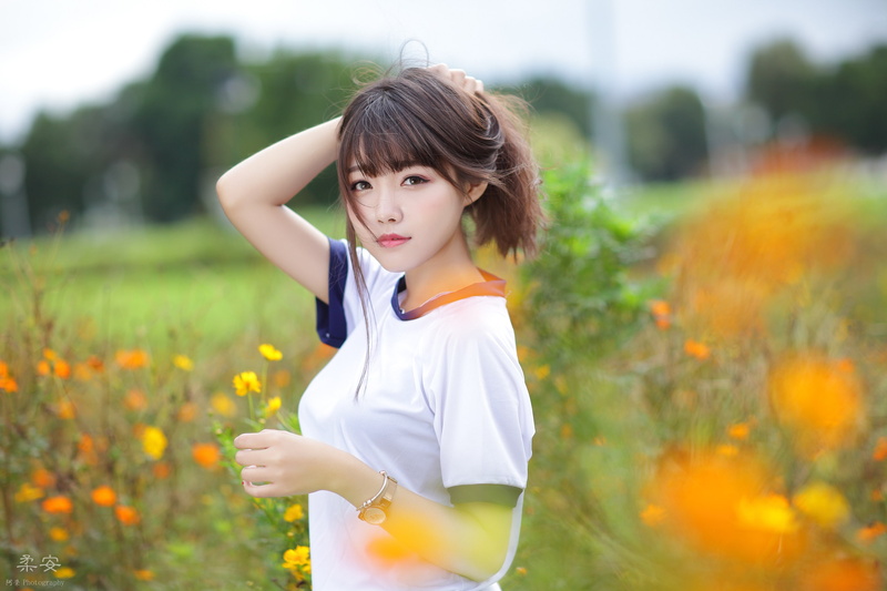 depth of field, T-shirt, outdoors, flowers, model, Asian, looking at viewer, portrait, women, brunette, watch, hair in face, bokeh, women outdoors, 2K
