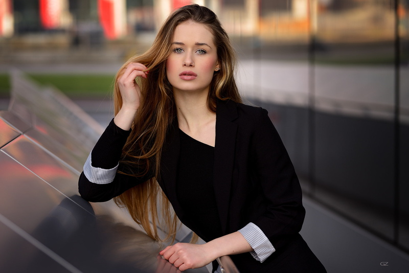young women, young adult, beauty, long hair, focus on foreground, lipstick, brunette, adult, looking, waist up, holding, looking away, hair, one person
