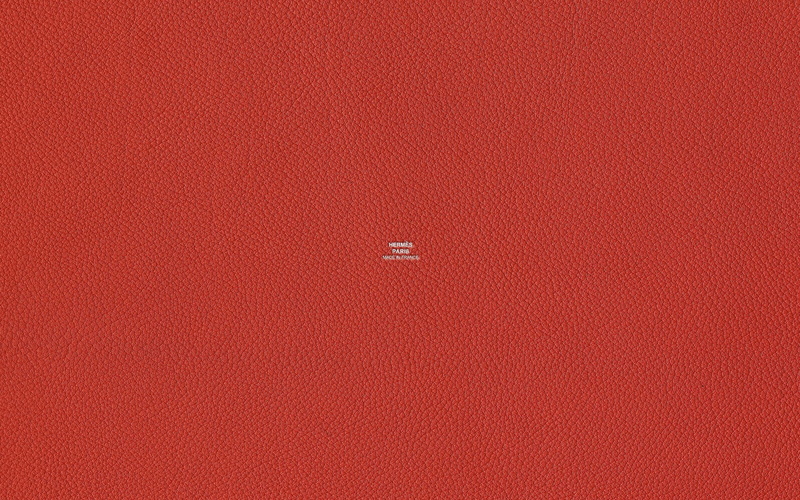 single object, colored background, indoors, texture, 2K, leather, safety, security, red, day, color, backgrounds, mode of transportation, textured, flying