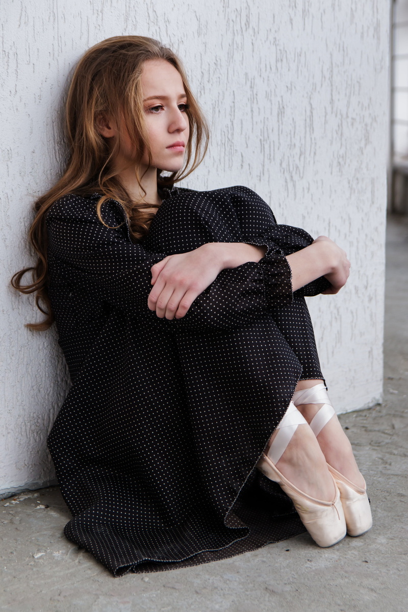 young adult, clothing, photo, real people, portrait, women, beside, lifestyles, hair, female, girl, hairstyle, adults only, sitting, wall, long hair, daytime
