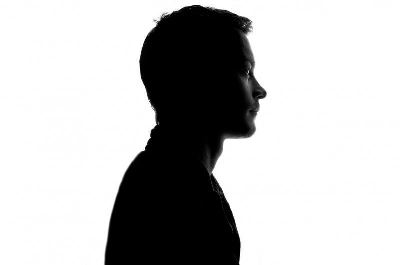 shadow, standing, contemplation, solitude, hairstyle, indoors, silhouette, side View, face, male, portrait, untitled, one Person, moody, copy space, headshot