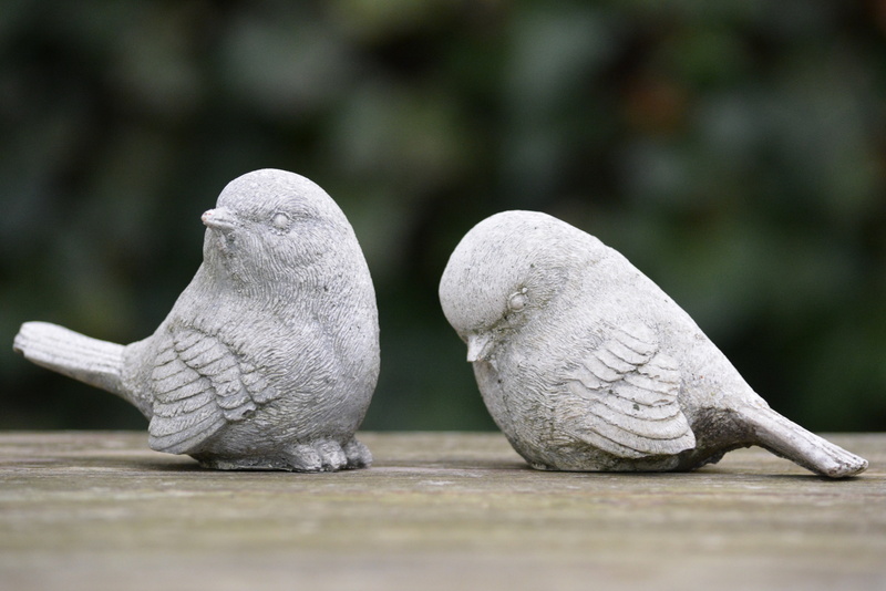 rejection, emotion, outdoors, no people, selective focus, gray, twist, focus on foreground, two, representation, art and craft, grey, white color, bird