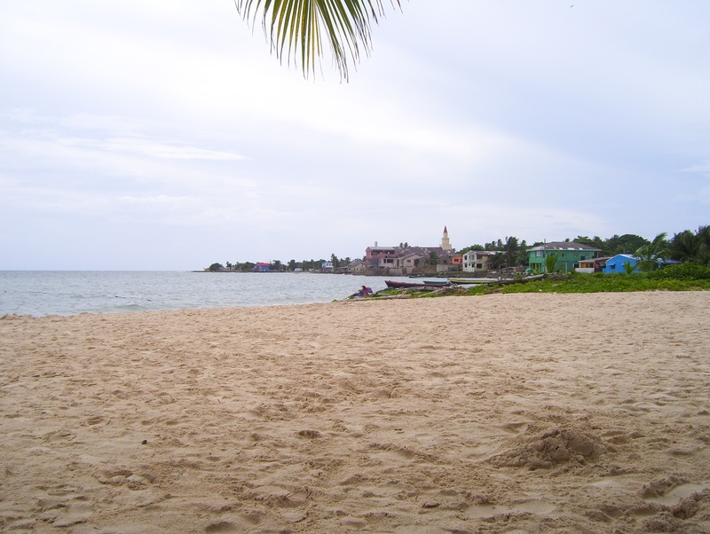 caribbean, land, beauty in nature, beach, no people, architecture, water, coconut palm tree, outdoors, transportation, nature, tropical climate, cloud - sky