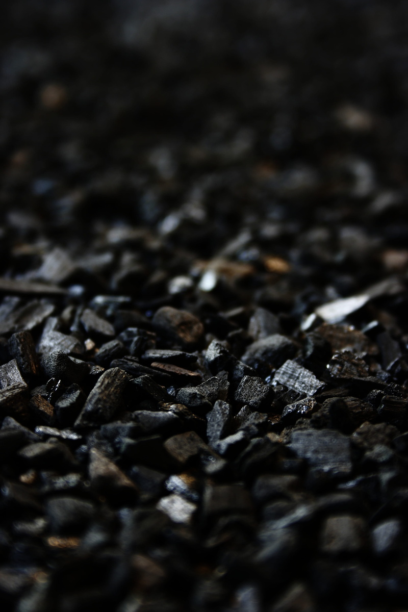 rough, brown, black, no people, food, abundance, stone - object, pattern, selective focus, surface level, charcoals, blur, indoors, briquettes, large group of objects