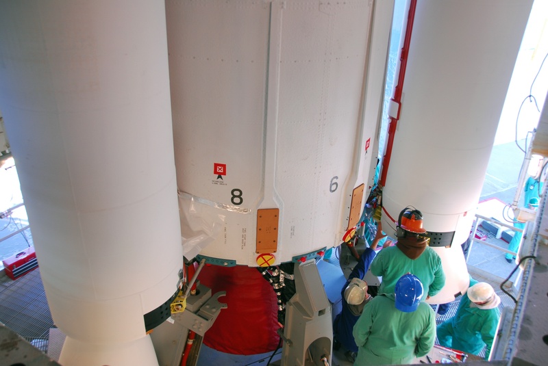 responsibility, science, working, teamwork, engineering, protective workwear, solid rocket booster, occupation, attaching, standing, vandenberg, aerospace industry