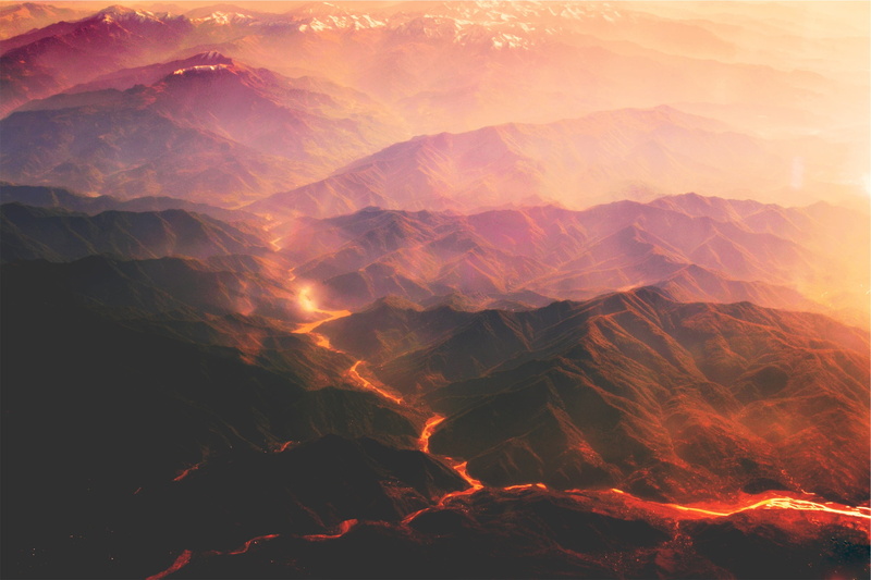 no people, sunset, beauty in nature, tranquil scene, non-urban scene, magma, mountain range, arid climate, remote, dramatic landscape, rock formation, climate