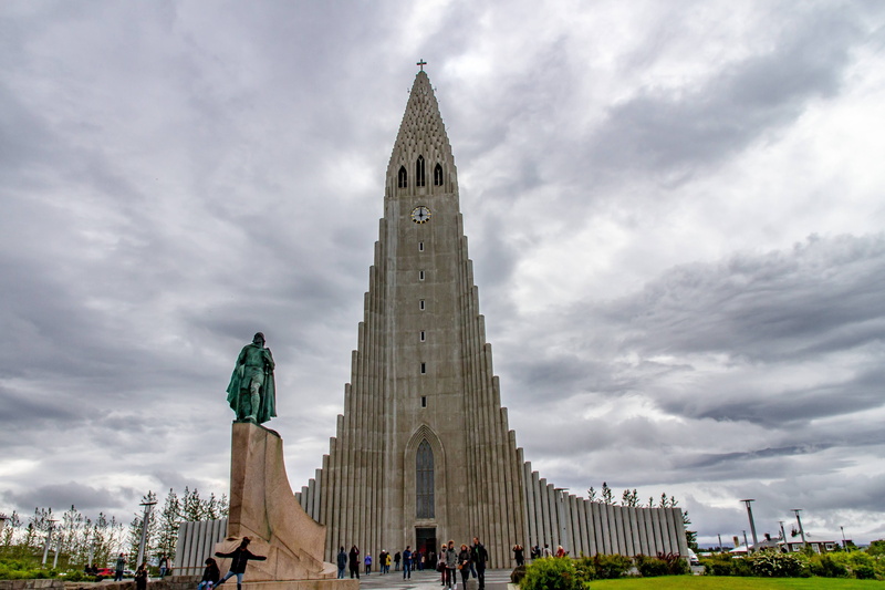 representation, travel, building exterior, cloud - sky, tall - high, real people, sky, architecture, incidental people, built structure, nature, sculpture