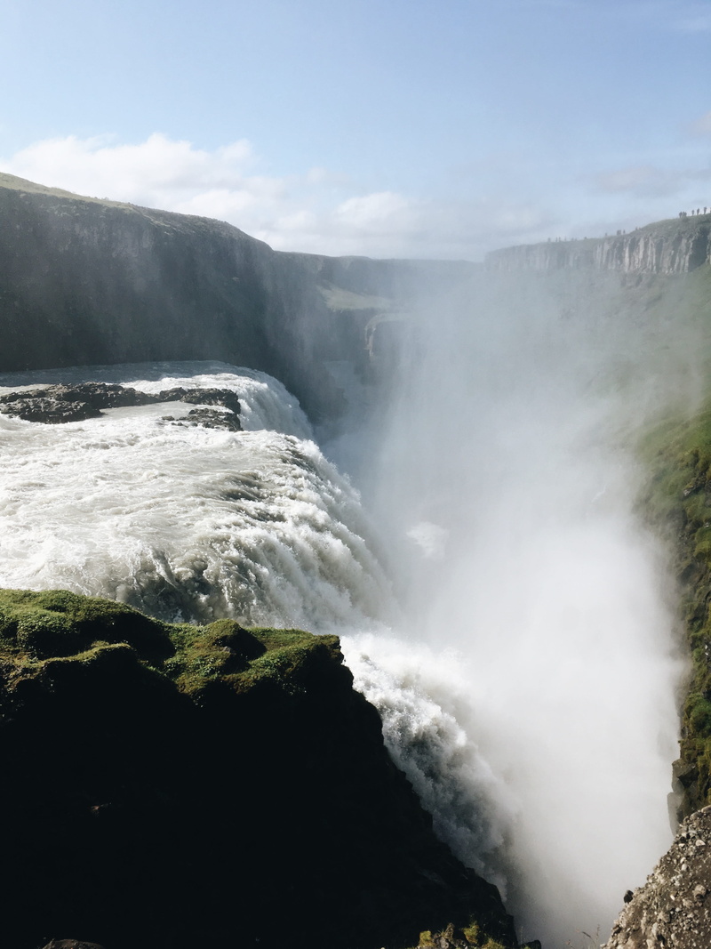 mist, water, non-urban scene, rocks, power in nature, motion, mighty, power, powerful, grass, iceland, beauty in nature, gullfoss falls, outdoors, blue