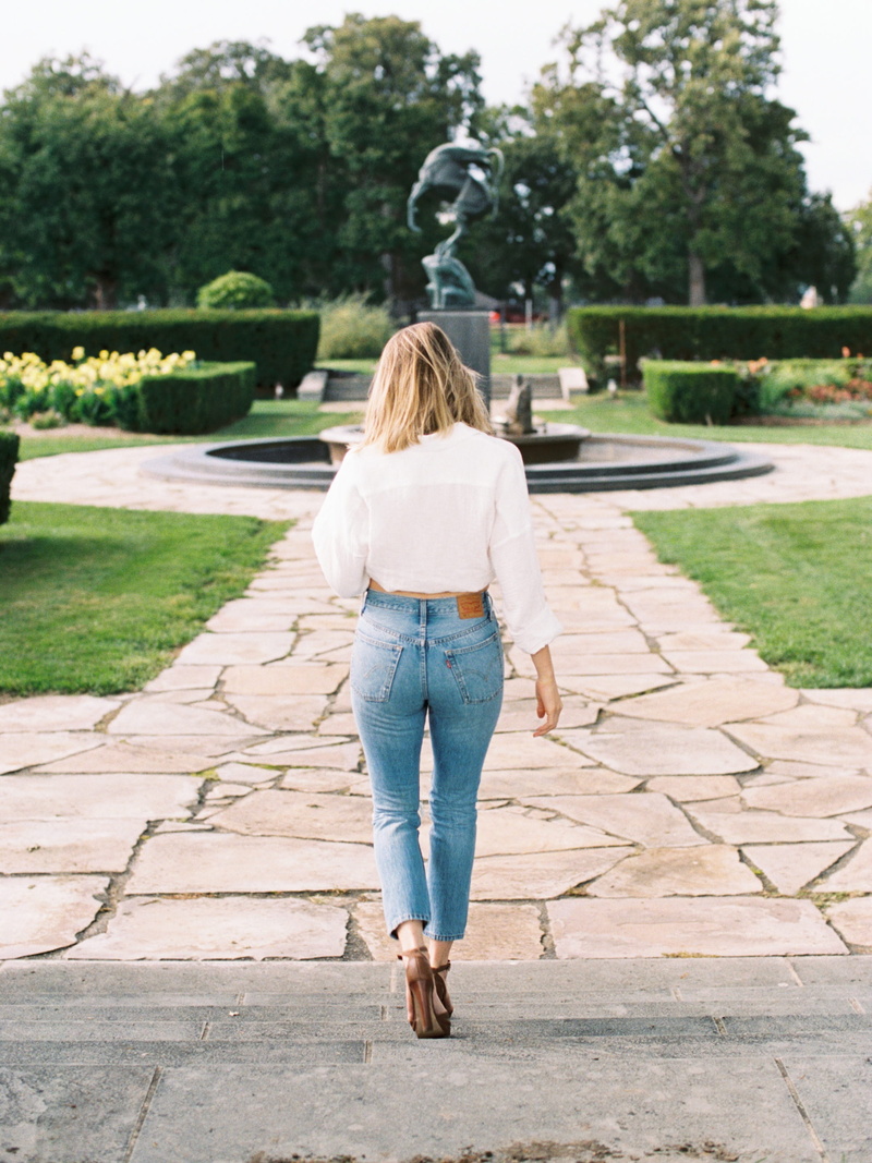 female, water, denim, woman, adult, pants, footwear, clothing, jeans, long hair, hair, united states, 2K, full length, outdoors, leisure activity, grass