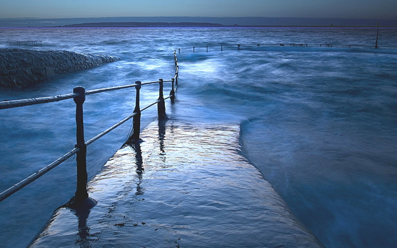 beach, flooded, breaking, motion, no people, land, railing, water, outdoors, beauty in nature, landscape, illustration, scenics - nature, horizon over water
