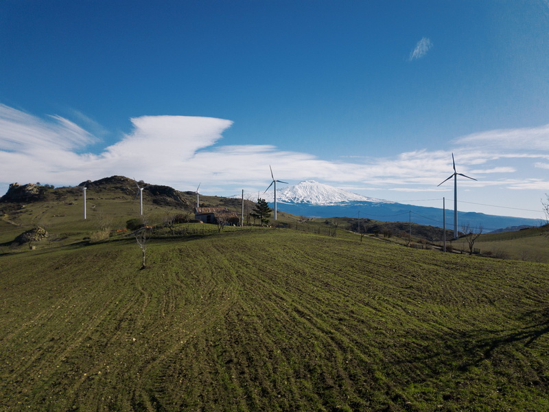 tranquil scene, trees, mount, etna, grass, mountain, snow, outdoors, wind, landscape, blue, plant, cloud - sky, environment, lines, field, scenics - nature