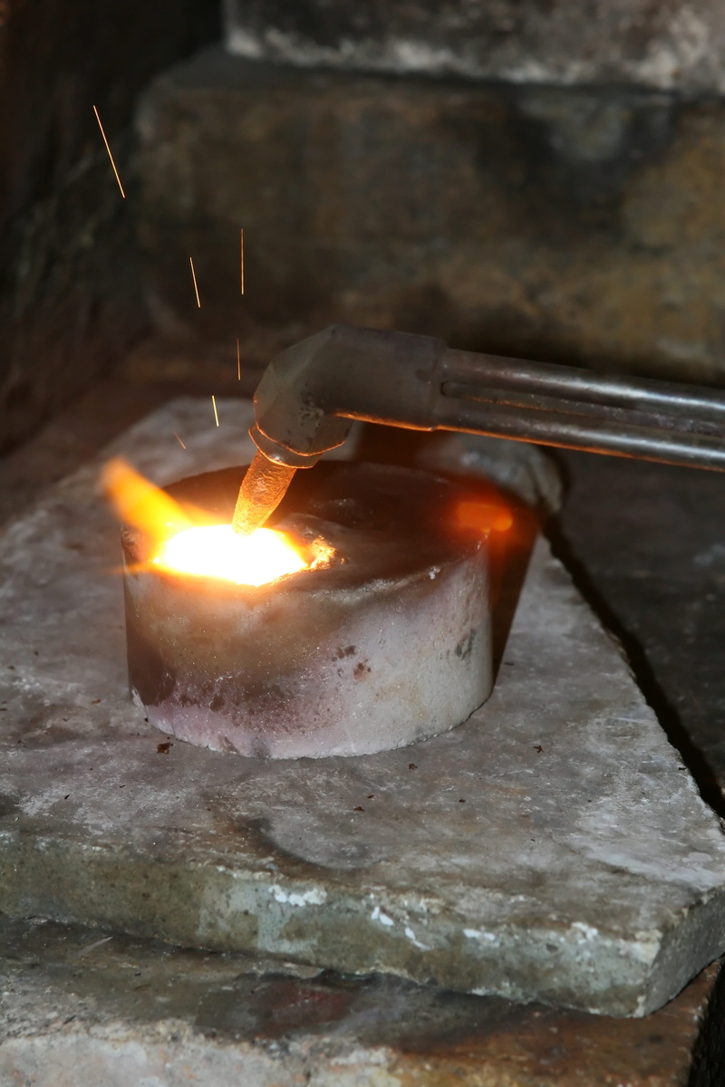 food and drink, welder, bronze, jewellery, no people, brass, production, silver, melt, preparation, close-up, glowing, indoors, food, metal industry, business
