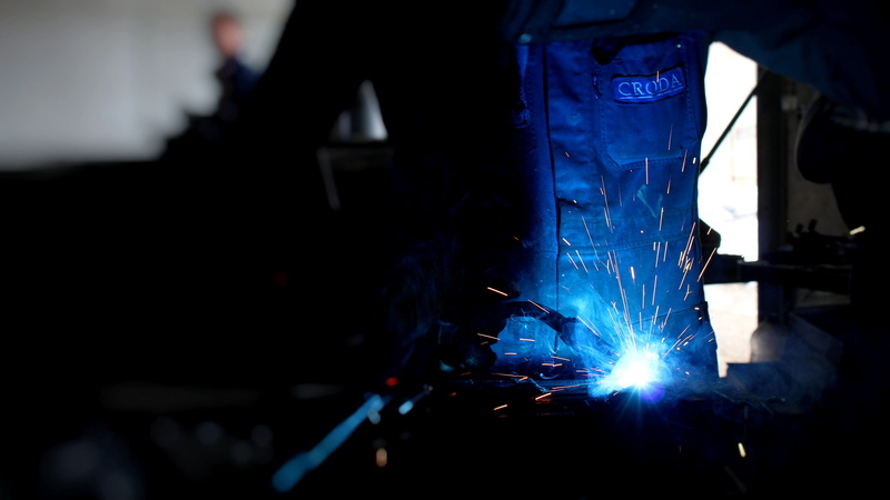 iron, protective workwear, factory, indoors, industry, car, person, people, men, metal industry, technology, working, illuminated, occupation, close-up