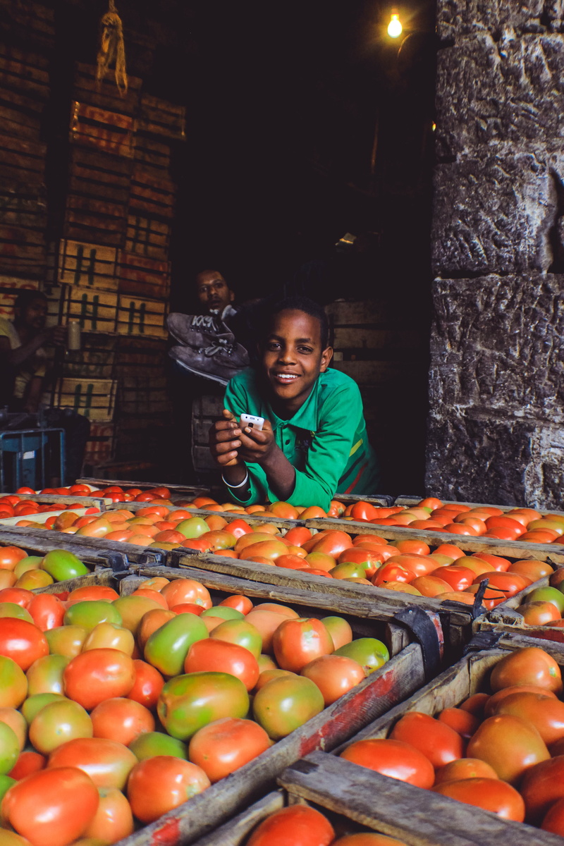 for sale, addis ababa, 5K, happiness, ethiopia, business, market, healthy eating, young adult, leisure activity, freshness, food and drink, retail, vegetable