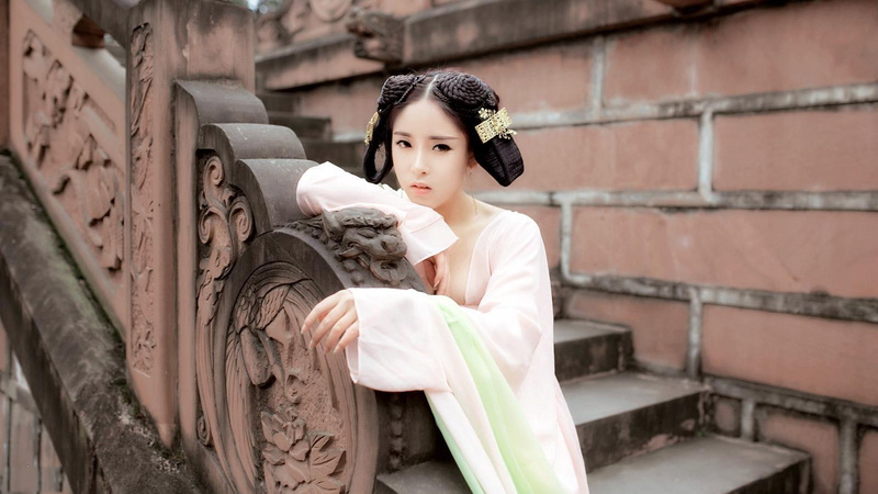 clothing, brick, wall, 720P, sitting, architecture, Asian, Chinese dress, fashion, three quarter length, females, one person, adult, holding, contemplation