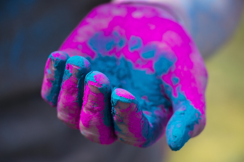 selective focus, 5K, neon colored, no people, rang barse, left, holi, studio shot, blue, pink color, pigment, focus on foreground, red, multi colored