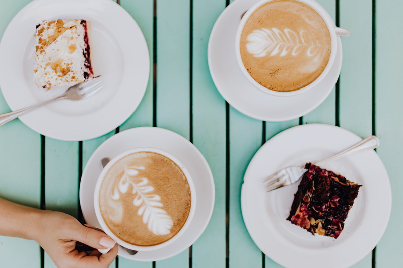 french food, hand, coffee, drink, refreshment, human body part, friends, crockery, frothy drink, cake, directly above, coffee - drink, eating, mug, high angle view