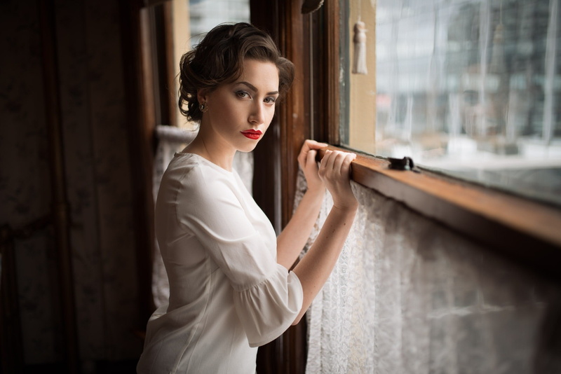 women, 1080P, waist up, young adult, side view, indoors, day, looking, holding, window, young women, one person, Kyle Cong, red lipstick, hairstyle, contemplation