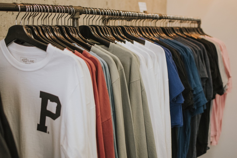 clothes, clothes rack, no people, textile, large group of objects, color, wardrobe, top, garment, indoors, coathanger, sale, business, clset, clothing