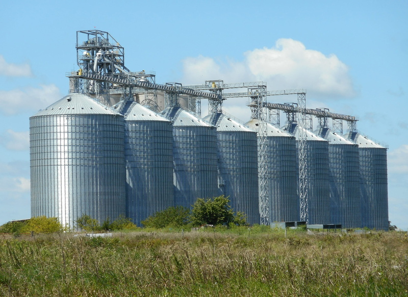 fuel and power generation, agriculture, industrial, low angle view, architecture, no people, gray, land, silver colored, industry, silos, 2K, cloud - sky