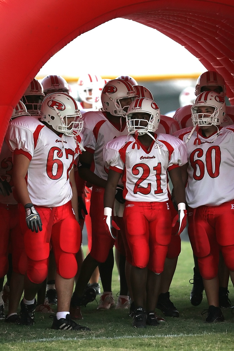 pre-game, child, football, football team, cooperation, american football player, side by side, teamwork, team, outdoors, football players, high school