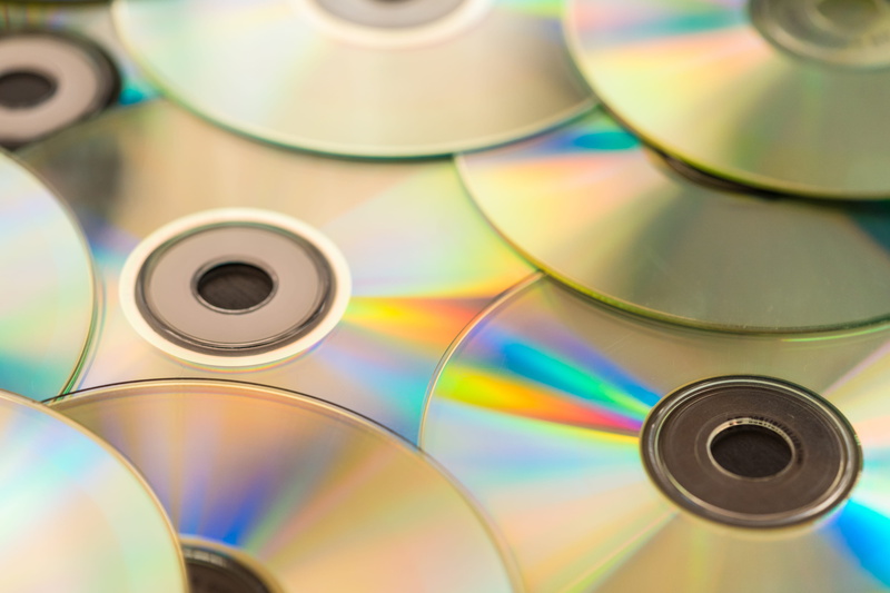 technology, focus on foreground, selective focus, blue, compact Disc, movies, media, dVD, music, disk, DVDs, 4K, colorful, indoors, plastic, pattern, multi Colored