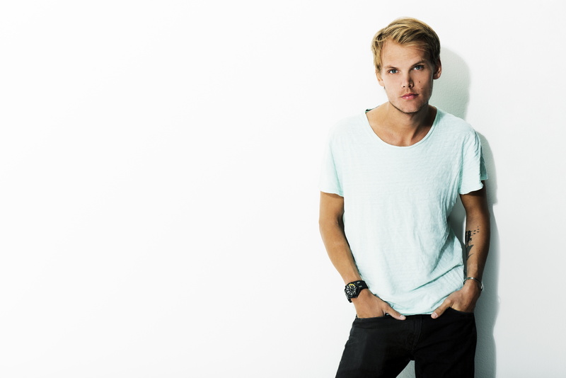 white background, front view, hands in pockets, music, three quarter length, looking at camera, one person, Avicii, standing, hairstyle, young adult, copy space