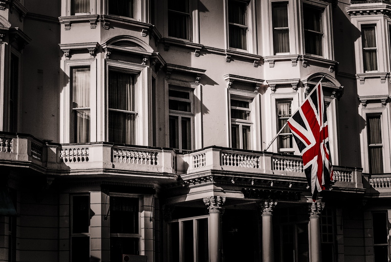 western script, national icon, window, union jack, no people, day, uk, architecture, built structure, residential district, building, red, text, independence