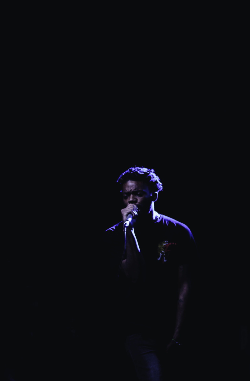 cut out, indoors, concert, singer, atlanta, standing, young adult, united states, rapper, black, lifestyles, young men, light - natural phenomenon, rap