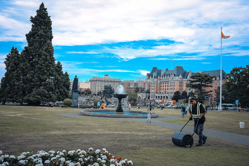 building exterior, queen vic, the past, nature, history, plant, outdoors, cloud - sky, incidental people, day, canada, adult, grass, women, victoria, real people