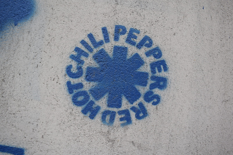 information, red hot chili peppers, close-up, peppers, arabesque pattern, communication, white color, trademark, creativity, hot, ampersand, chili, western script