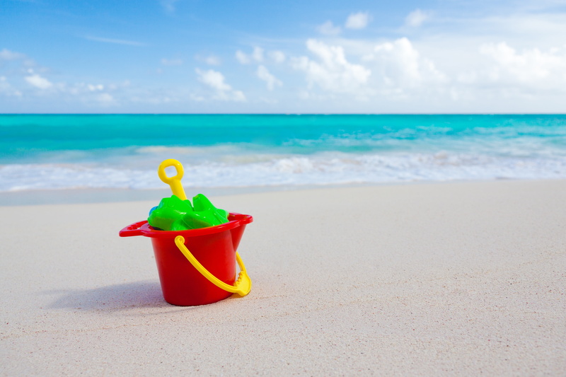 sand, tranquility, plastic, beach, holiday, near, toy, water, land, toys, bucket, travel, summer, ocean, red, relax, beauty in nature, leisure, sea, horizon