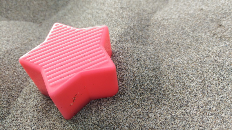beach, close-up, indoors, building blocks, stars, rug, sand beach, no people, concrete, nature, pink color, land, star, game, toy, protection, single object