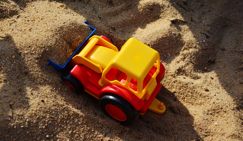 outdoors, no people, nature, toy, land, plastic toys, sand, excavators, multi colored, scoop, still life, car, yellow, pay, high angle view, childhood