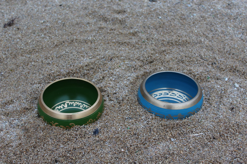 no people, field, meditation, geometric shape, sand, nature, circle, shape, blue, outdoors, metal, day, close-up, plastic, still life, land, heart, beach